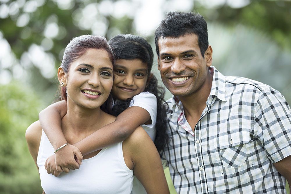 happpy family smiling after dental bonding therapy