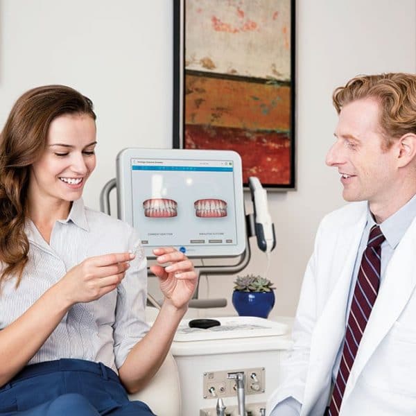 invisalign dentist with patient